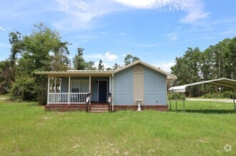 Building Photo - 5735 Riviera Prado