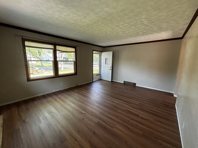 Living room looking at front door - 615 S Anderson St