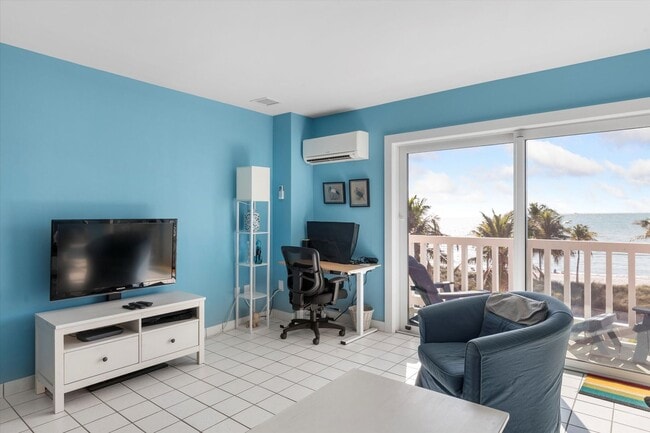 Building Photo - Wake Up to Ocean Views – Fully Furnished 2BR/1BA Condo Available for 1-Year Lease!