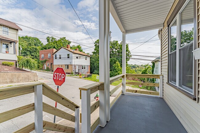 New handrails and privacy fence - 101 W 10th Ave