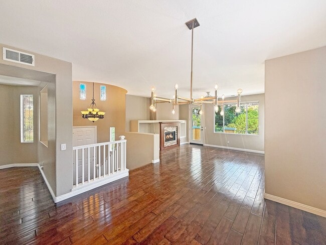Building Photo - Spacious 3BR/2.5BA Home with Gated Communi...
