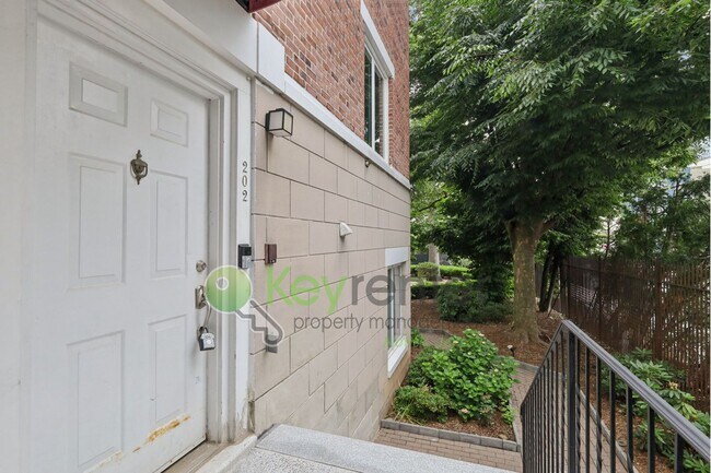 Building Photo - Spacious 2BR/2BA Duplex in Gated Community with Parking, Washer/Dryer & NYC Skyline Views