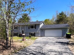 Building Photo - 10279 Woodwind Dr