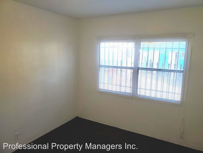 Building Photo - 6340 10th Ave