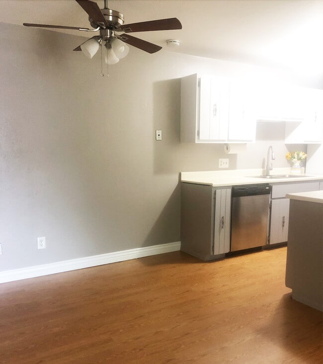 Well, Equipped Kitchen with Plenty of Cabinets and Counter Space - 16259 W 10th Ave