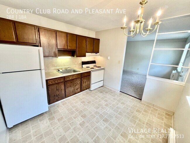 Foto del edificio - Move-in Ready! Roomy end-unit 2-bed w/ on-...