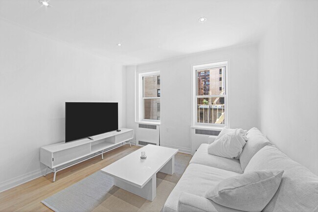 Foto del edificio - 210-218 W 19th St