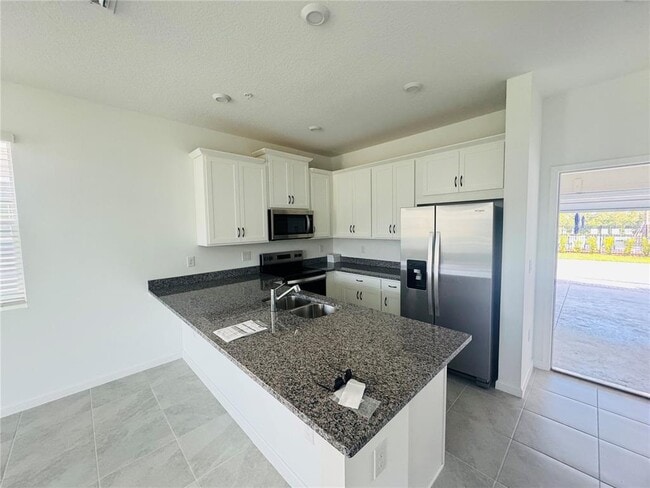 Building Photo - 3156 Gardenia Reserve St