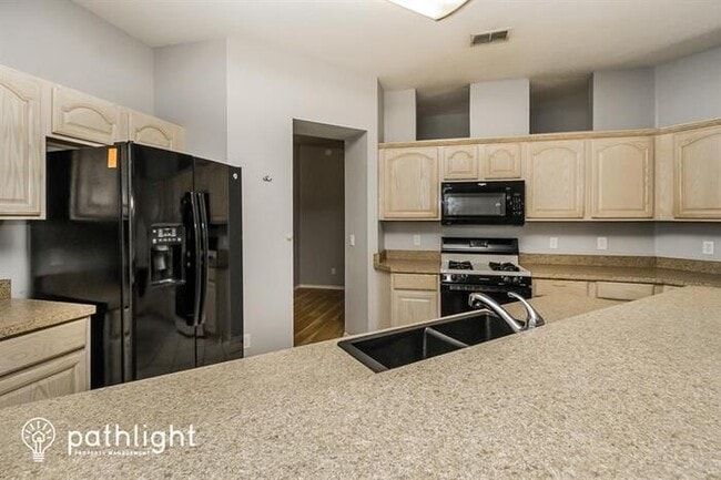 Building Photo - 5690 Magnolia Bloom Terrace