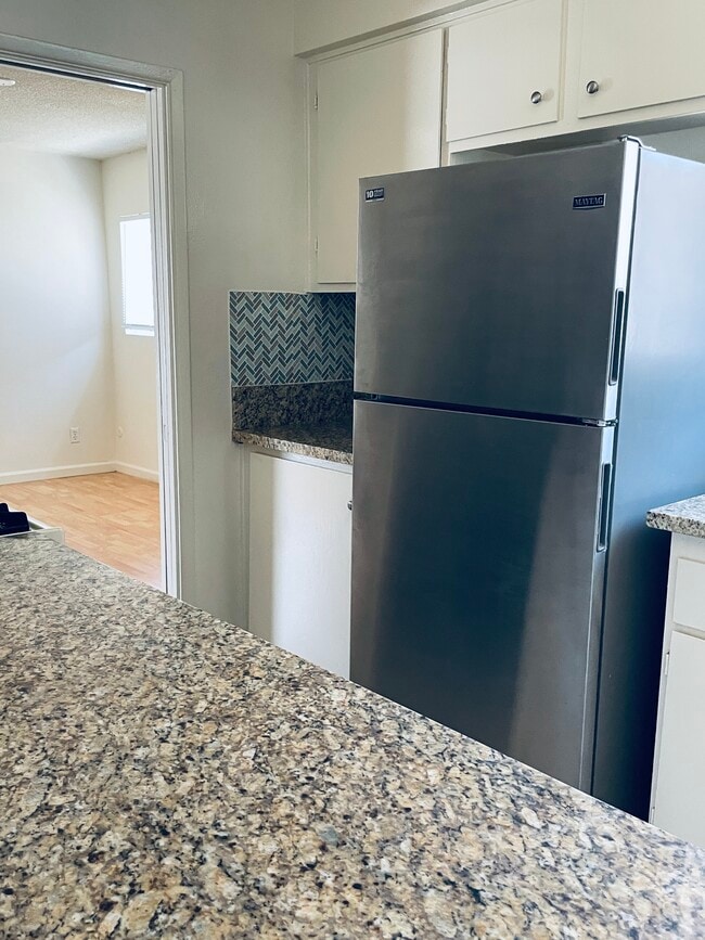 Full size family stainless ref. - 617 S Shelton St