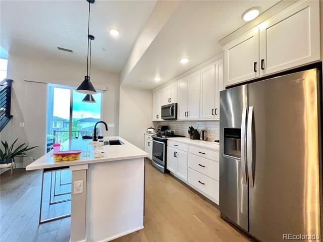 Building Photo - 1565 W 67th Ave