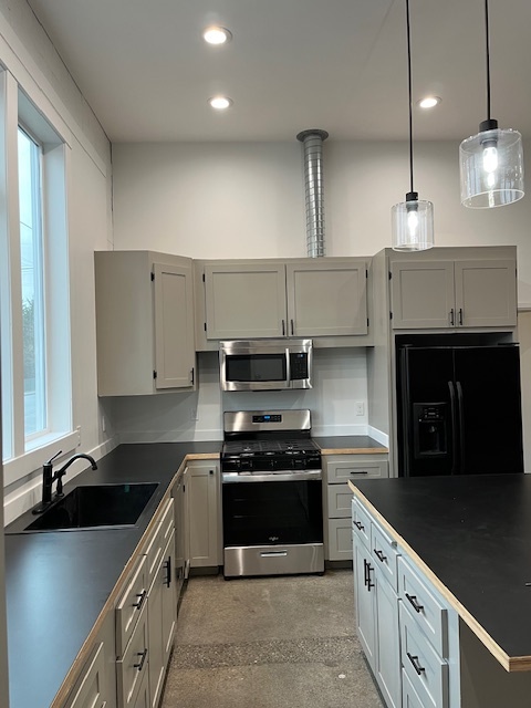 spacious kitchen with lots of natural light - 330 S Cherry St