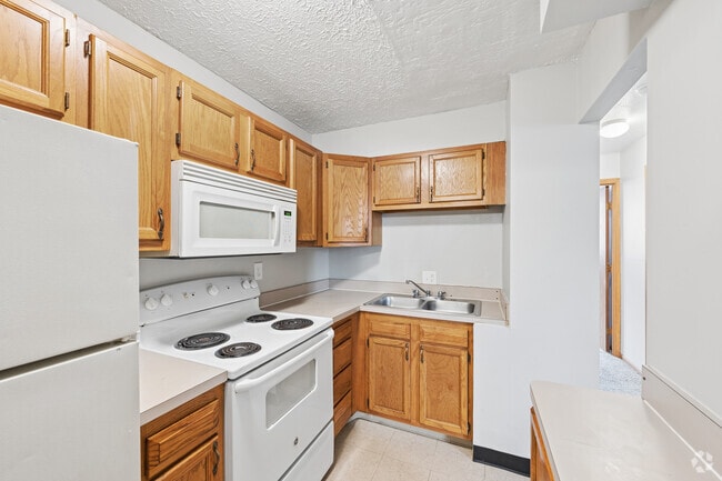 2BR, 1BA - 665SF - Kitchen - St. Charles Court Apartments