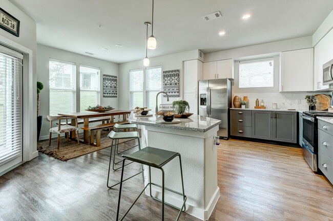 Spacious kitchen and dining room with natural lighting - Hardy Oak