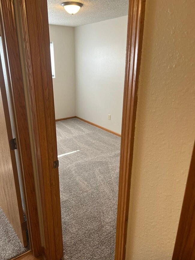 Building Photo - Large 3 bedroom apartment close to Sawyer Elementary, great for families