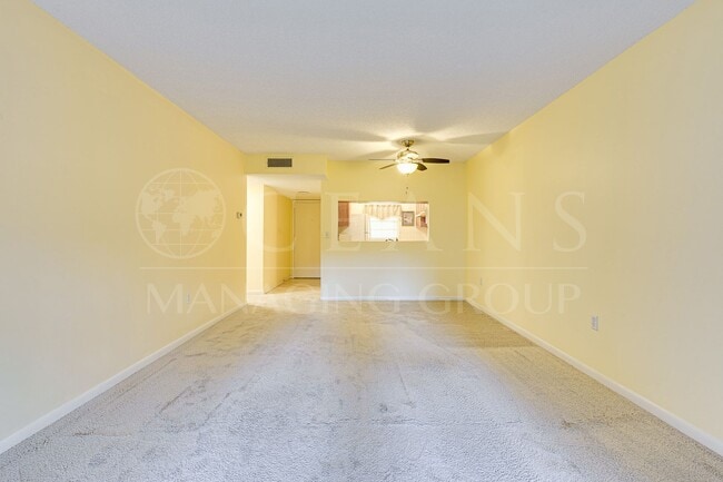 Building Photo - Spacious Condo with utilities included! Lo...