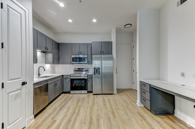 1BR, 1BA - 745SF - Kitchen - Domain on the Parkway
