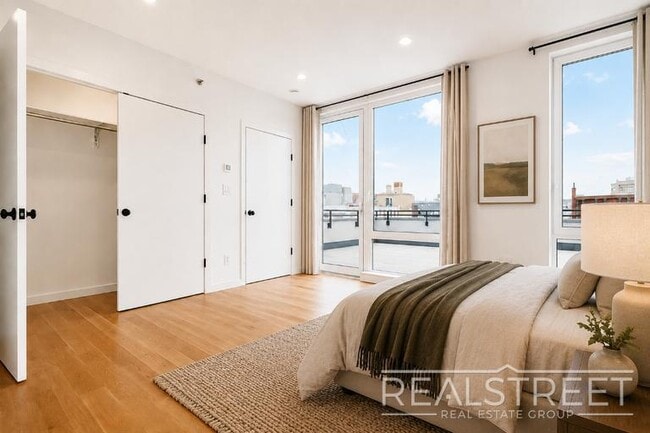 Building Photo - Sun-Filled Penthouse Duplex with Massive Private Terrace & Bonus Storage Room