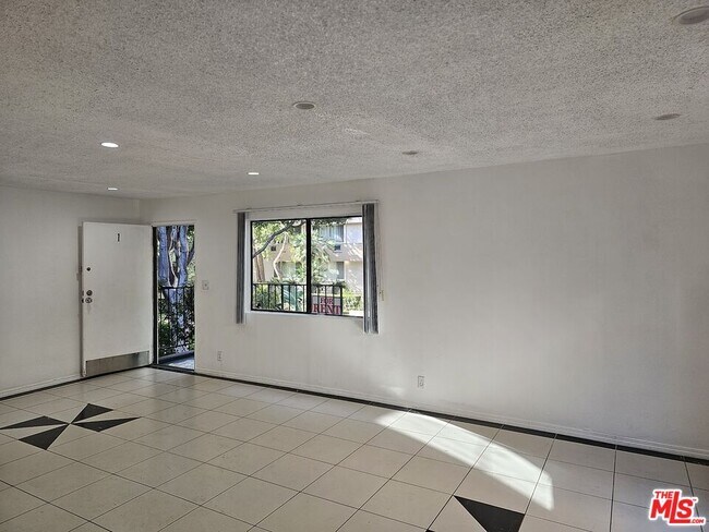 Building Photo - 1240 Flores St