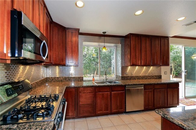 Building Photo - 4 br, 3 bath House - 18102 Jaguar Ct
