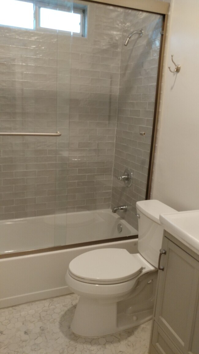 Bath with new tub, tile, toilet, vanity - 3211 W 48th St