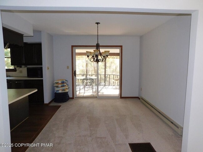 Building Photo - 3-bedroom, 2-bath home featuring an open f...