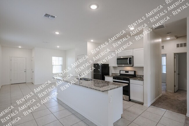 Building Photo - 5720 W Sunrise Dr