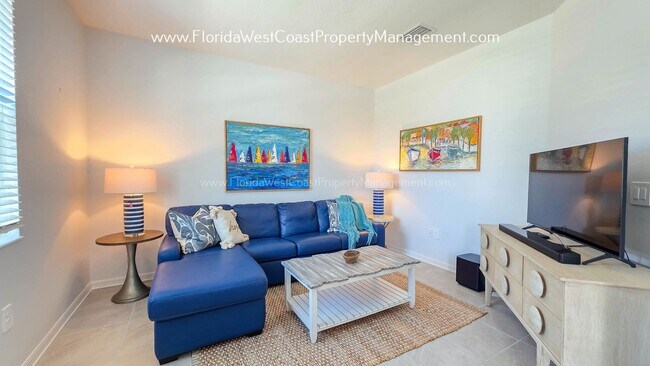 Building Photo - EXCEPTIONAL AND SPACIOUS FURNISHED TOWNHOME WITHIN WATERSIDE- NAUTIQUE!