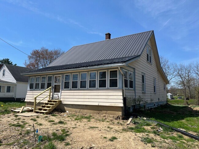 Building Photo - Completely Renovated Three Bedroom Home
