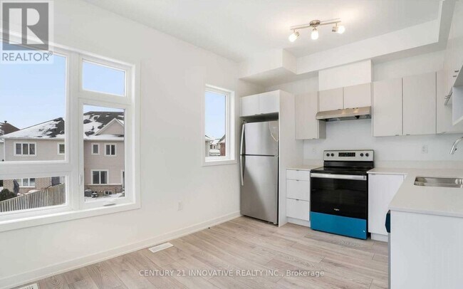 Photo du bâtiment - 3079 Cherry Blossom Cmn