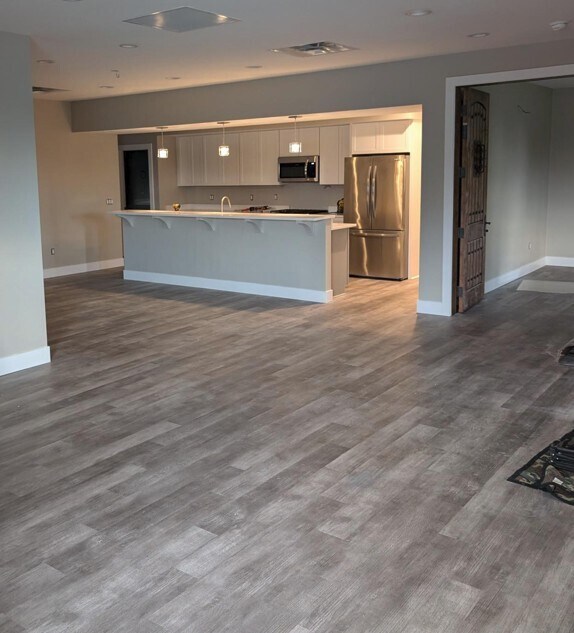 Unidad 3 Cocina-Sala de estar - Northwood Patio Homes