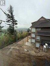 Building Photo - 3 Tree Tops Ln