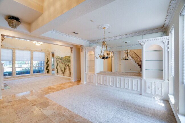 Foto del edificio - "Stately Gated 5-Bedroom Estate With Pool, Custom Details & Abundant Living Space!"