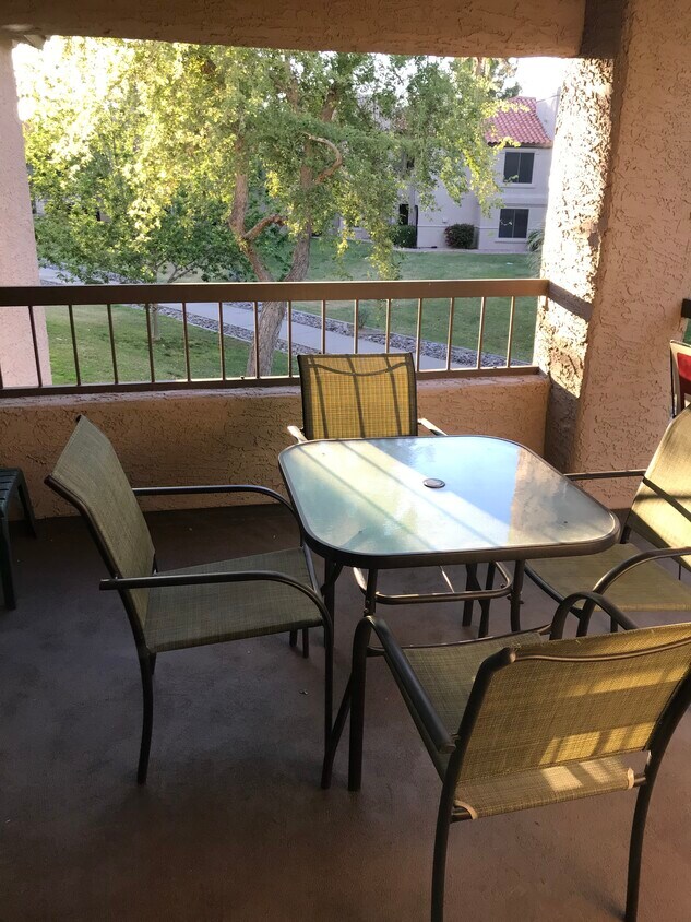 Balcony off living room and kitchen overlooking Greenbelt - 9550 N 94th Plz