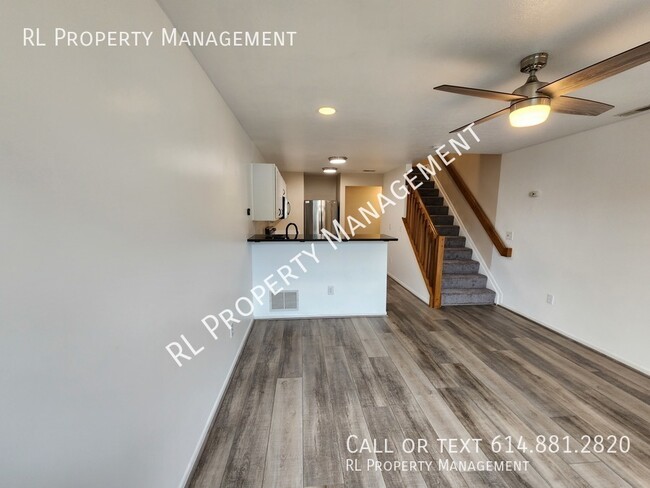Building Photo - Spacious 1 bedroom 1.5 bathroom condo in B...