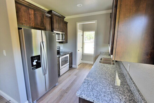 Kitchen looking towards utility area - 3613 Mandy Dr