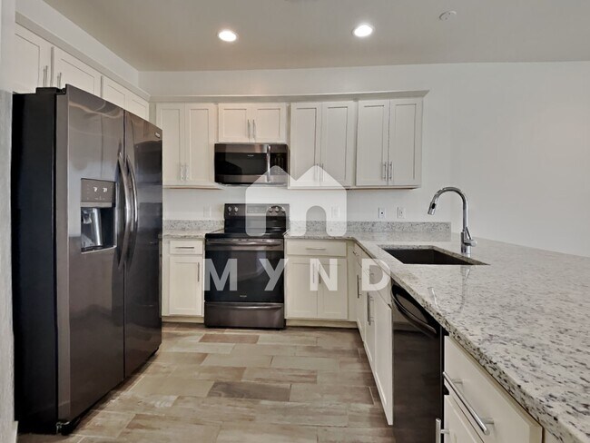 Building Photo - 4047 E Erie St Unit 101