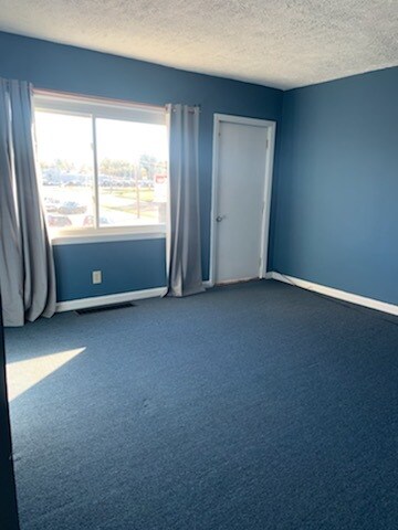 Living Room with Balcony Door - 1171 W Main St