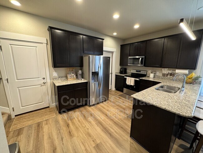 Building Photo - 6755 Carriage Meadows Dr