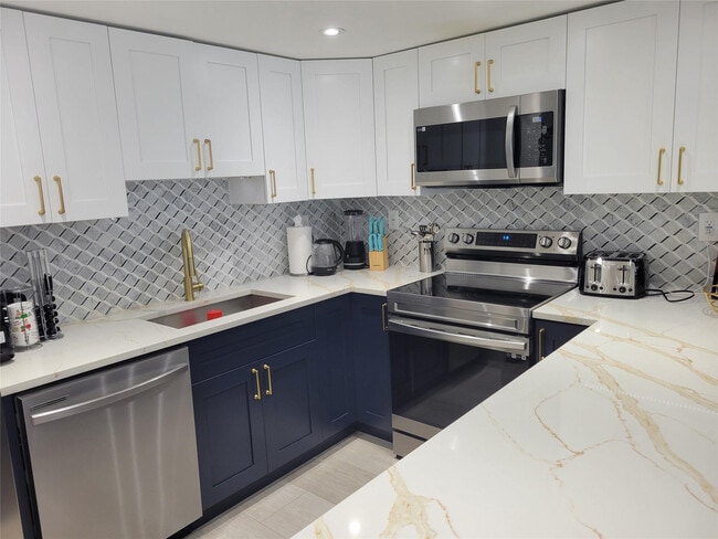 Building Photo - 19390 Collins Ave