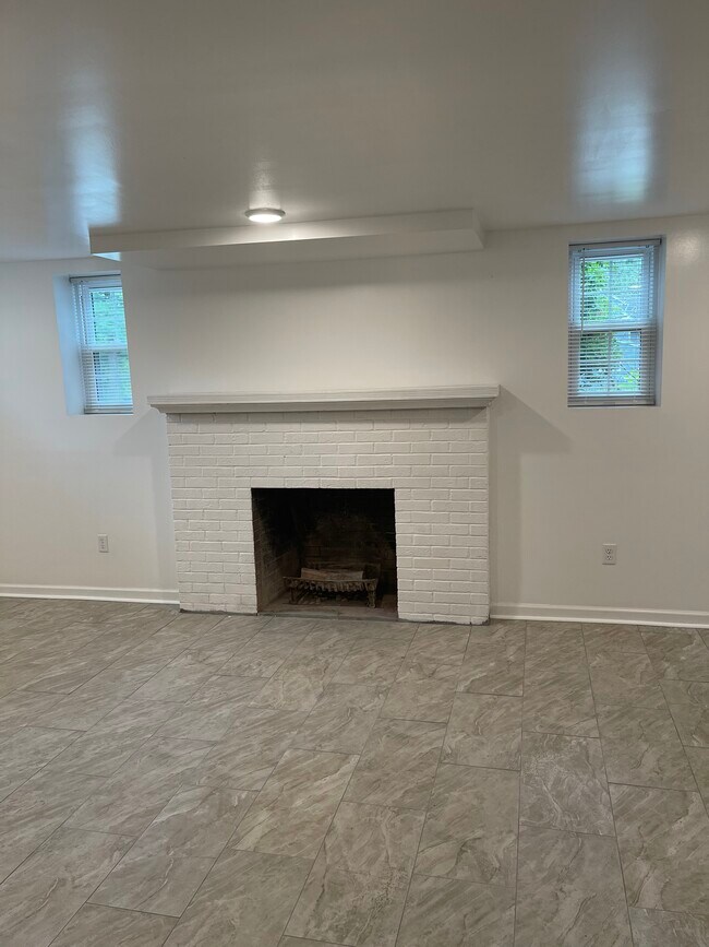 Living room fireplace - 300 E Upland Rd