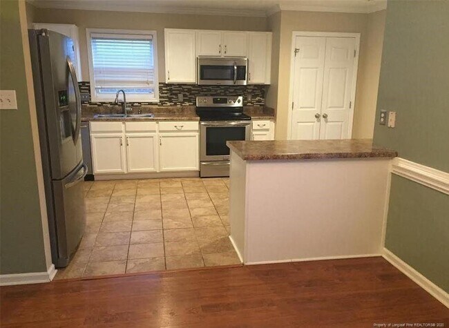 Building Photo - 1513 Laurel Oak Dr
