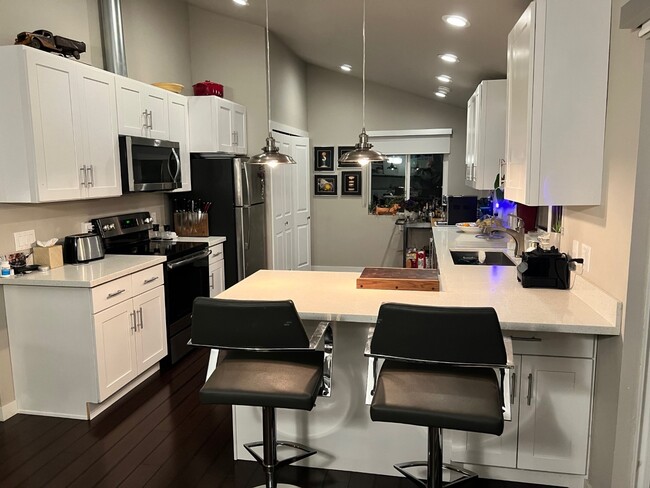 Breakfast bar in kitchen - 12526 35th Ave NE