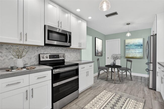 Building Photo - 7613 NW 67th Ave