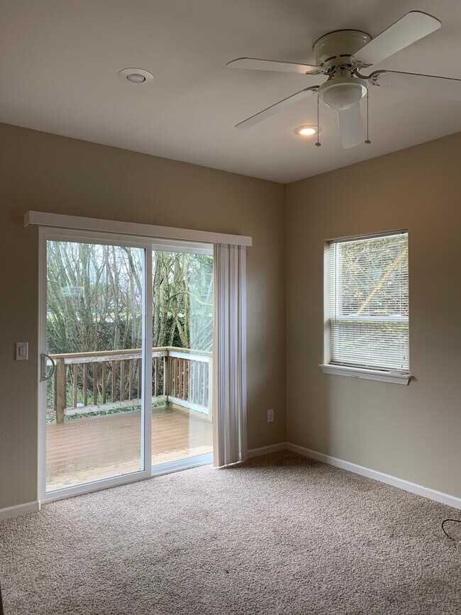 Sliding door to deck and private backyard area. - 103 Thendara Park Dr
