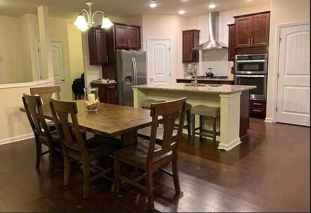 Open concept living room, dining and kitchen - 248 Tilth St