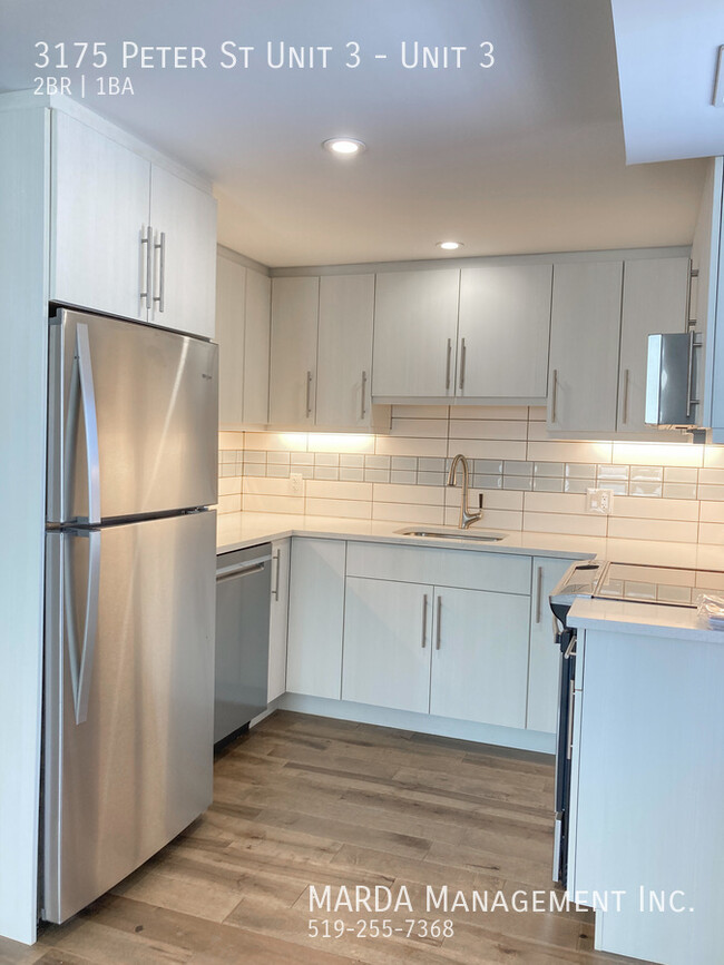 Building Photo - STUNNING RENOVATED 2-BEDROOM/1-BATH UPPER ...