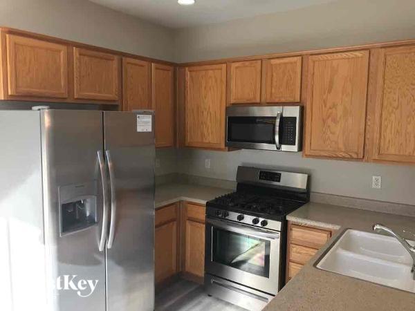 Foto del edificio - 8289 Harvest Spring Pl