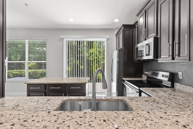 Building Photo - Lake Nona End-Unit Townhome on Preserve | Pool | Move-In Ready
