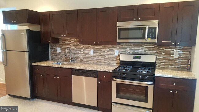 Foto del edificio - 5037 Florence Ave